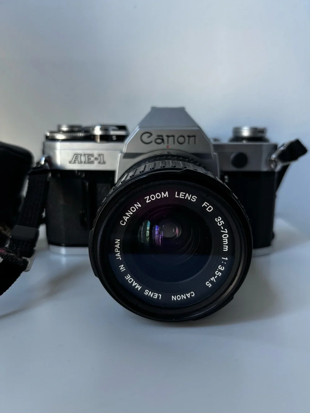 Canon AE-1 with Zoom Lens and Strap